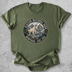 Glacier National Park mountain goat t-shirt Green badge Montana Est 1910 alpine graphic tee
