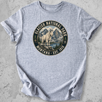 Glacier National Park mountain goat t-shirt Light Grey badge Montana Est 1910 alpine graphic tee